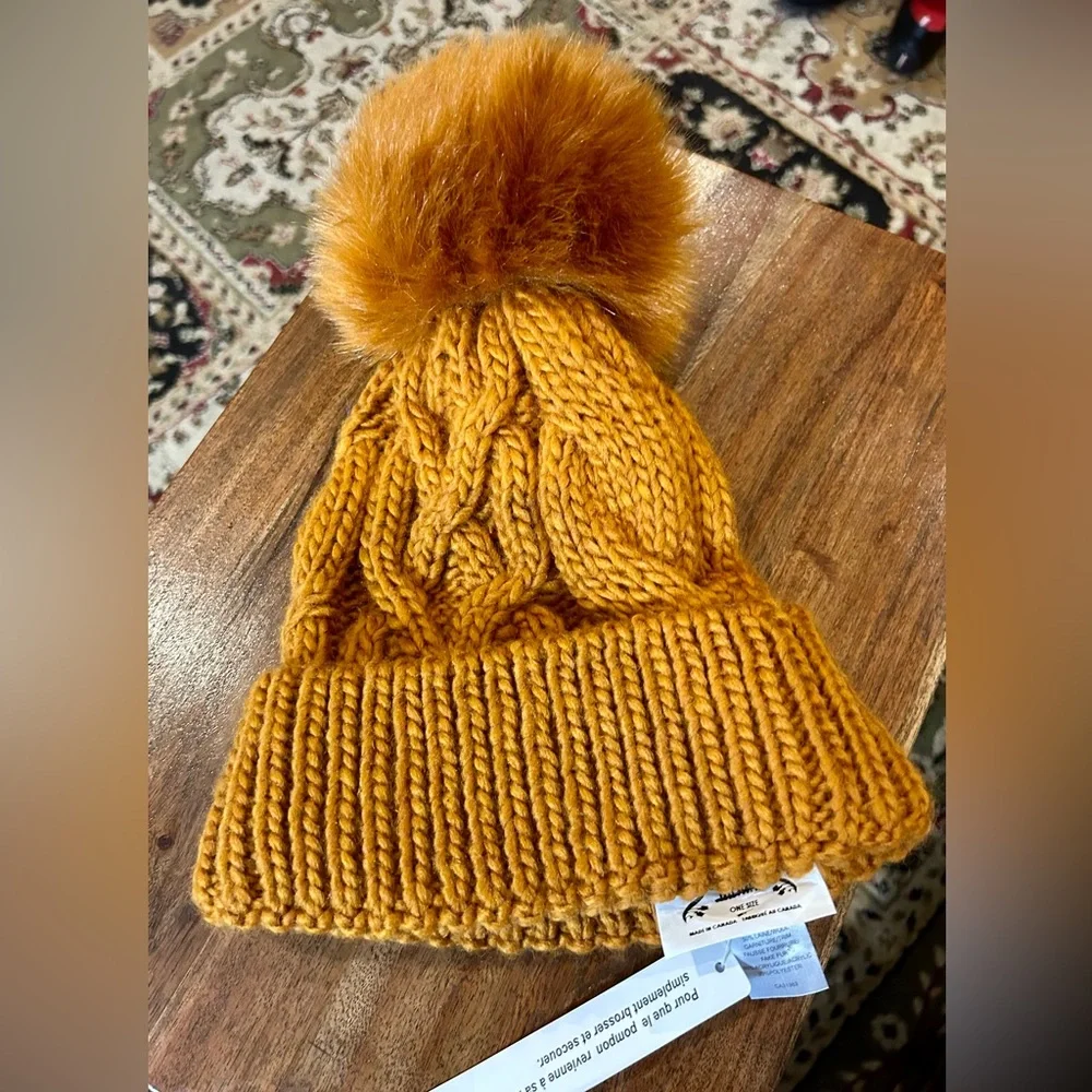 Free People-Pinnacle Pompom
Beanie NWT Mustard color with Pompon
(New) - Picture 1 of 7